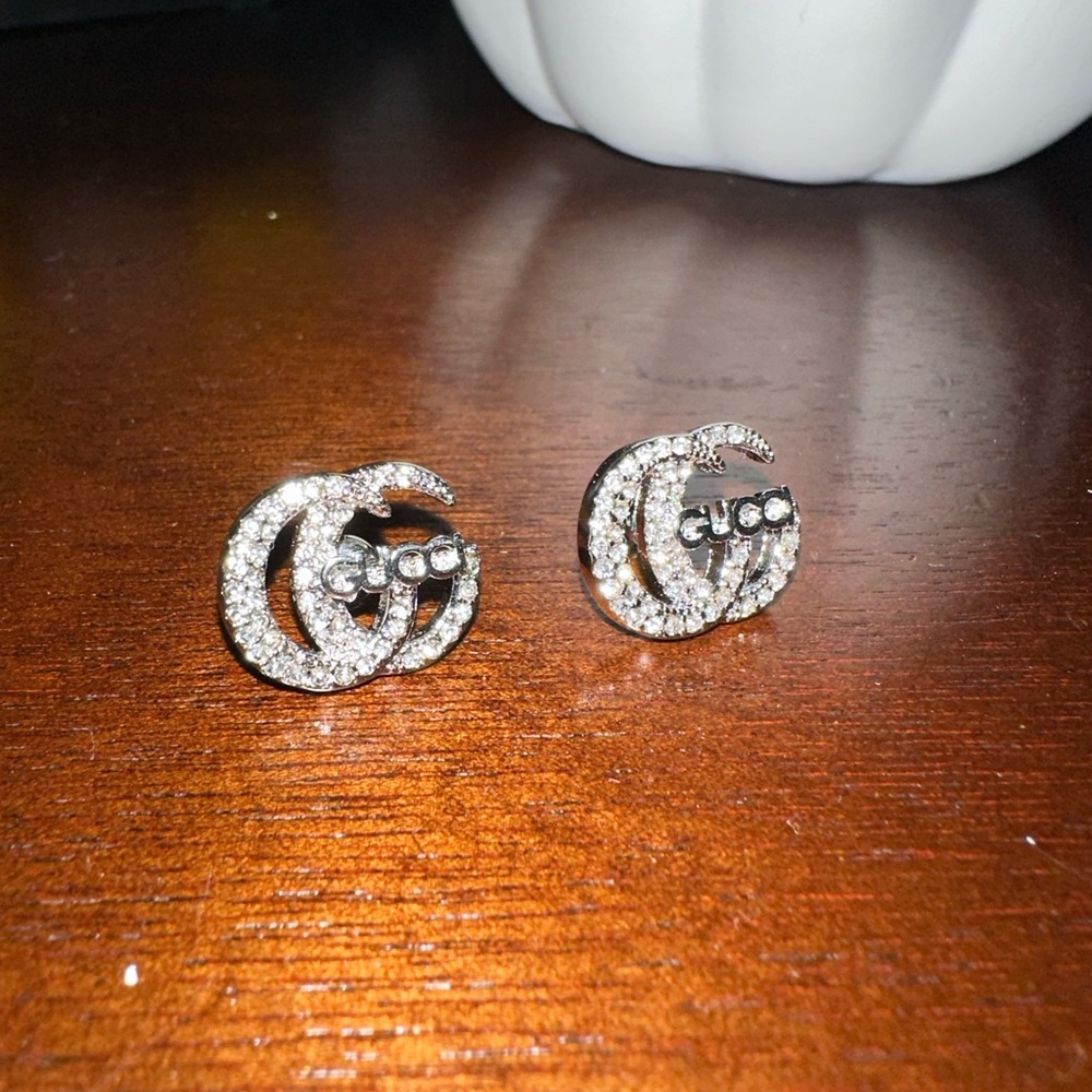 AUTHENTIC GUCCI SILVER CRYSTAL GUCCI NAME EARRINGS